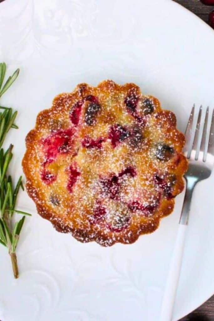 individual cranberry pie on plate.