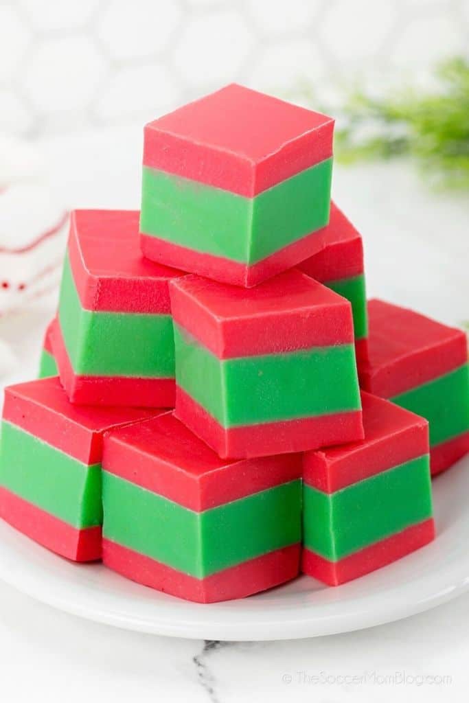 green and red christmas fudge on plate.
