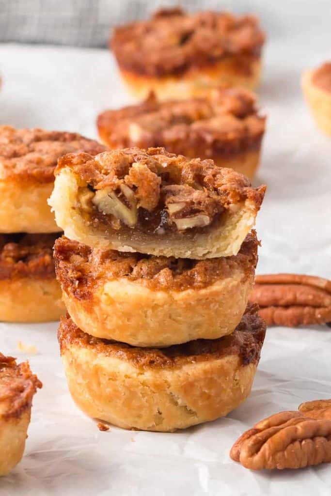 stack of bite size pecan tarts.