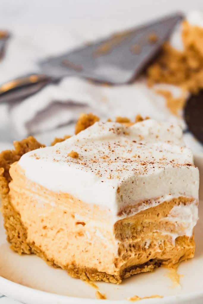 piece of pumpkin mousse pie on plate.