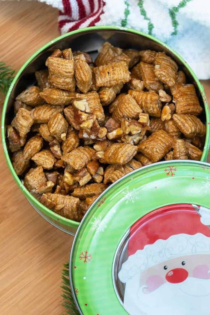 pecan praline crunch in christmas gift tin.