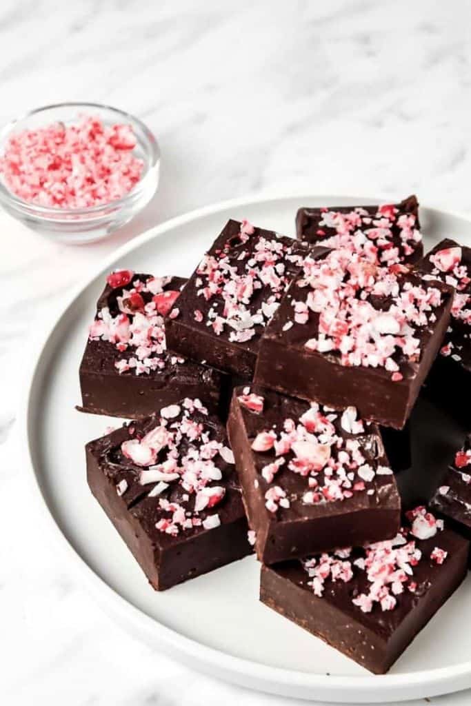 peppermint chocolate fudge squares on plate.