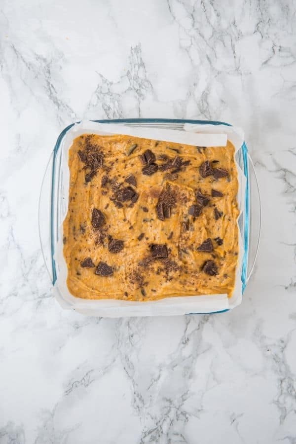pumpkin blondies mixture in dish.