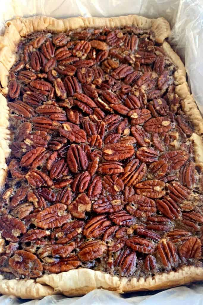 slow cooker pecan pie in tray.