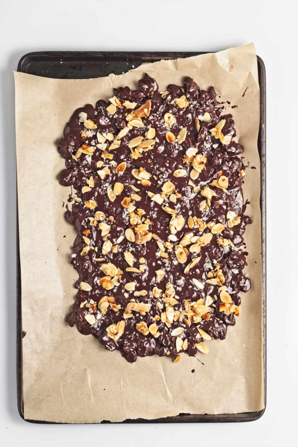 almond chocolate candy bark on tray setting.