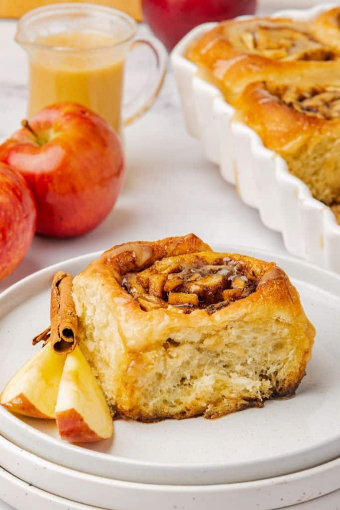 apple cinnamon roll on plate.