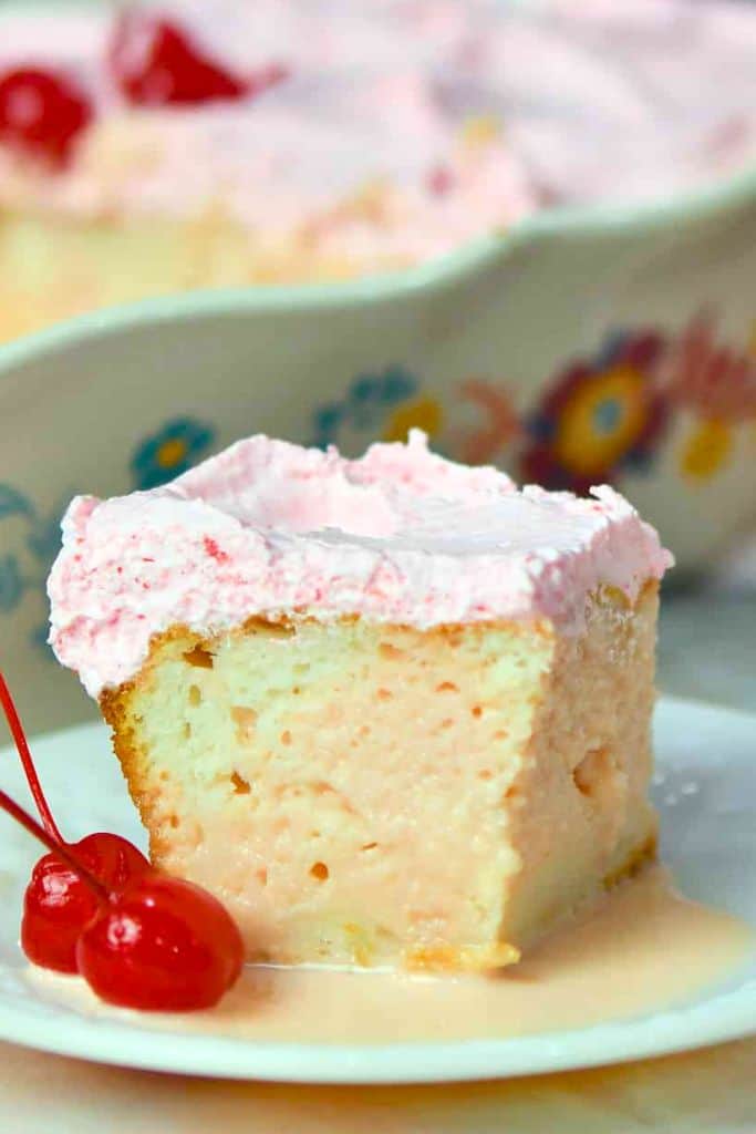 slice of tres leches cake made with boxed cake mix.