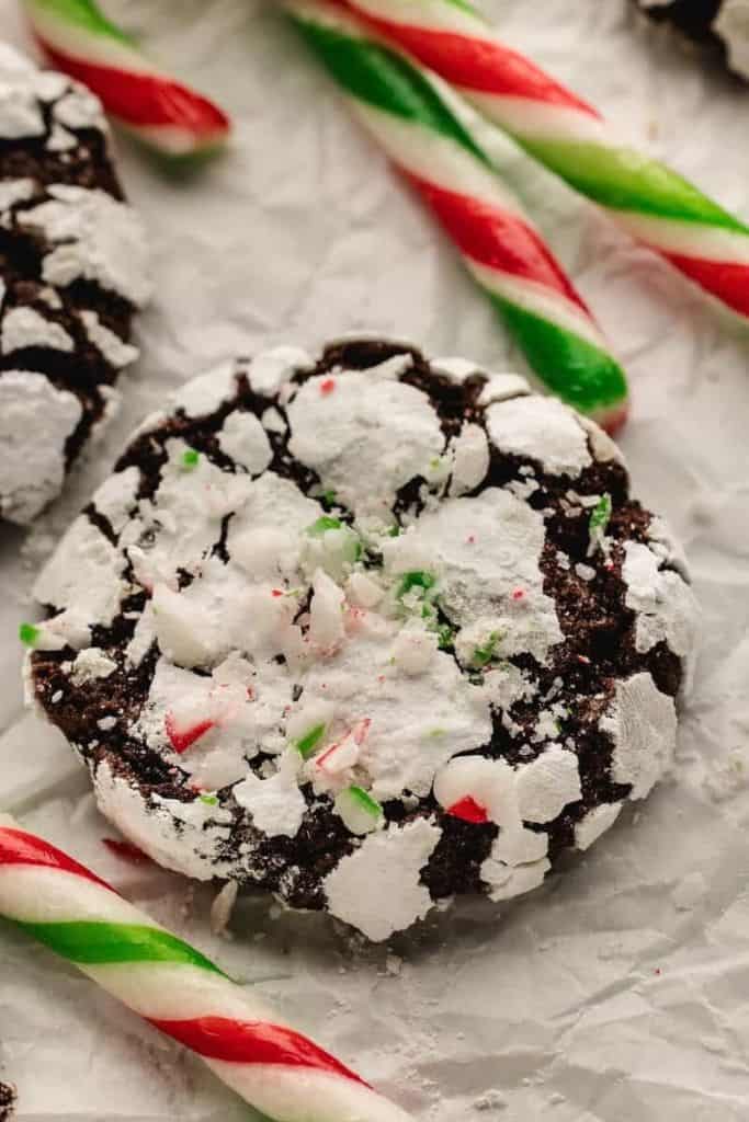 chocolate peppermint crinkle cookie with candy canes.