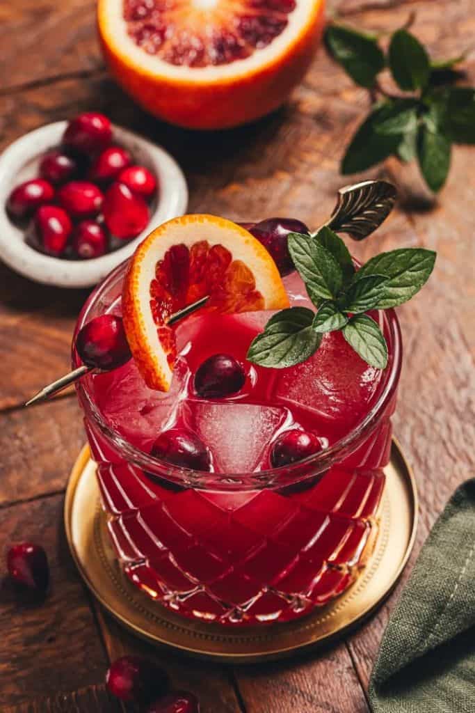 cranberry mocktail with garnishes.