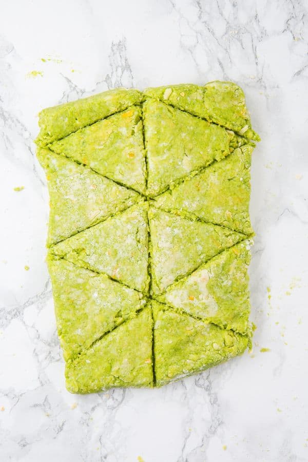 scone dough cut into diamond shapes.