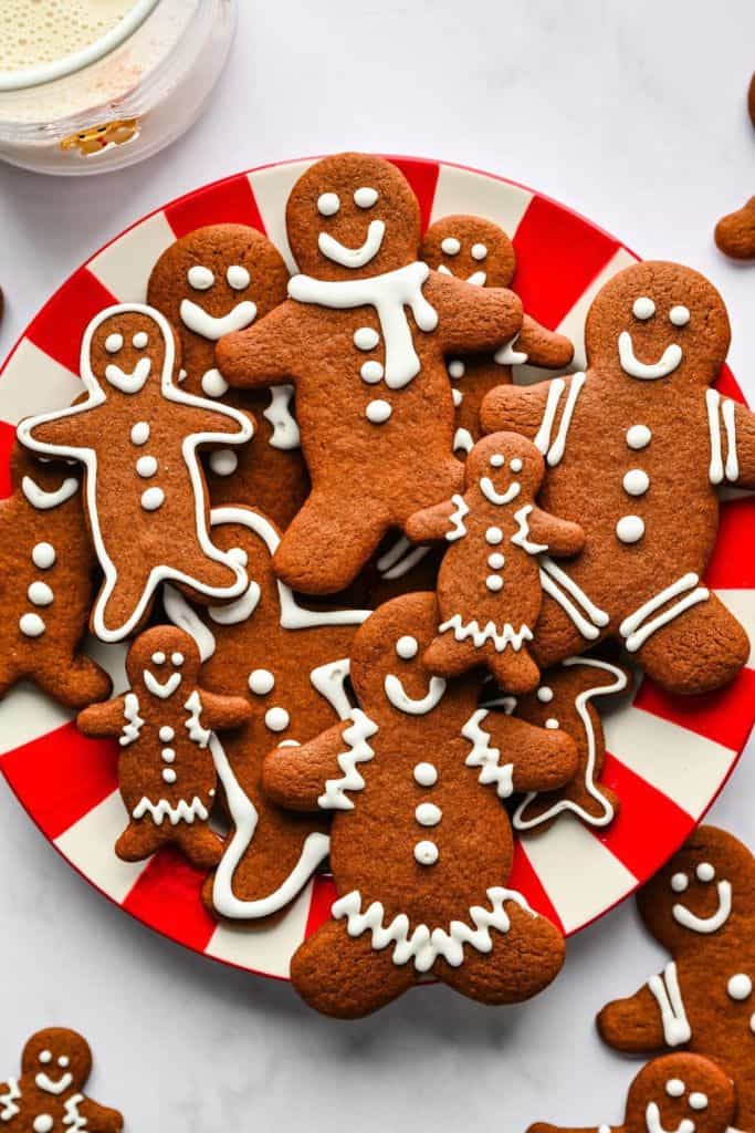 decorated gingerbread people on plate.