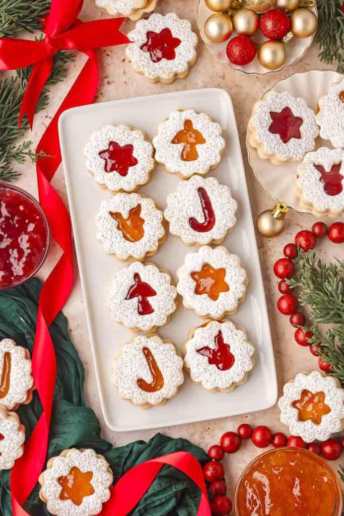 festive linzer cookies on platter.