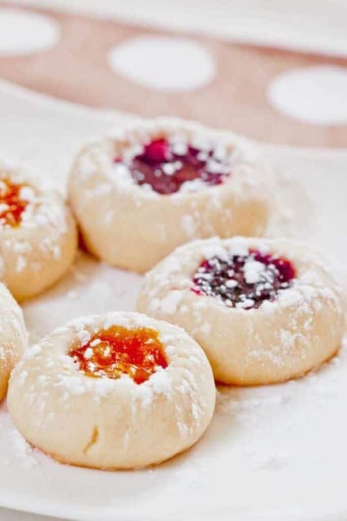 jam thumbprint cookies on plate.