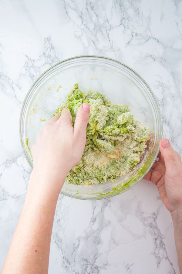 mixing scone dough in bowl.