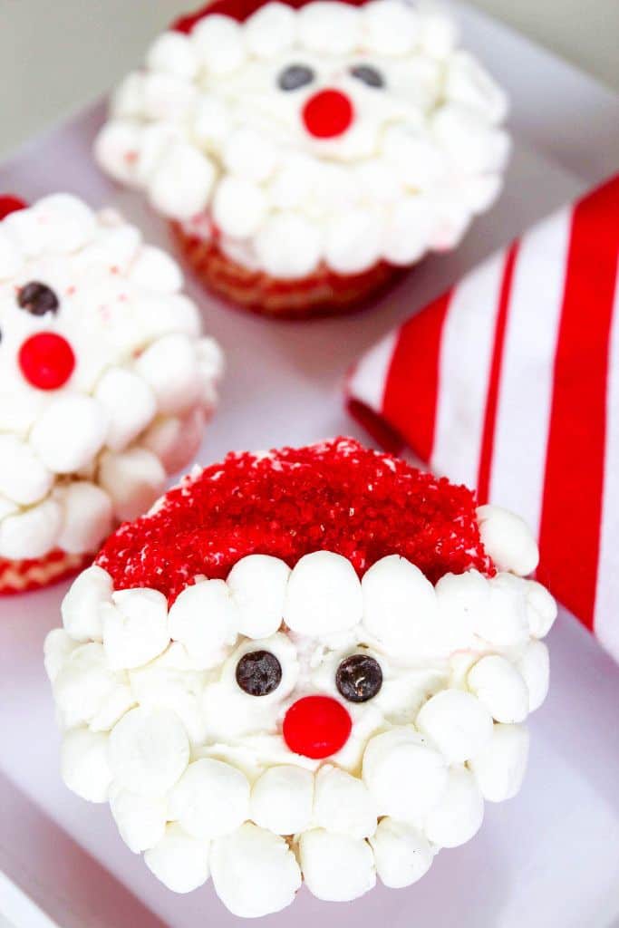 santa face cupcakes with white marshmallows.
