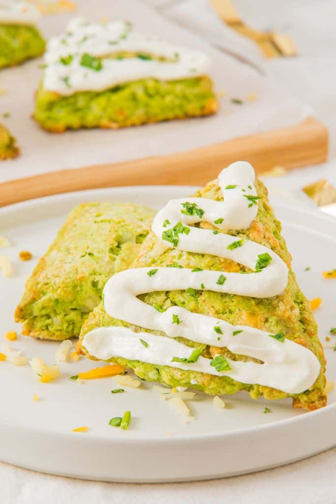 spinach cheese scones on plate.