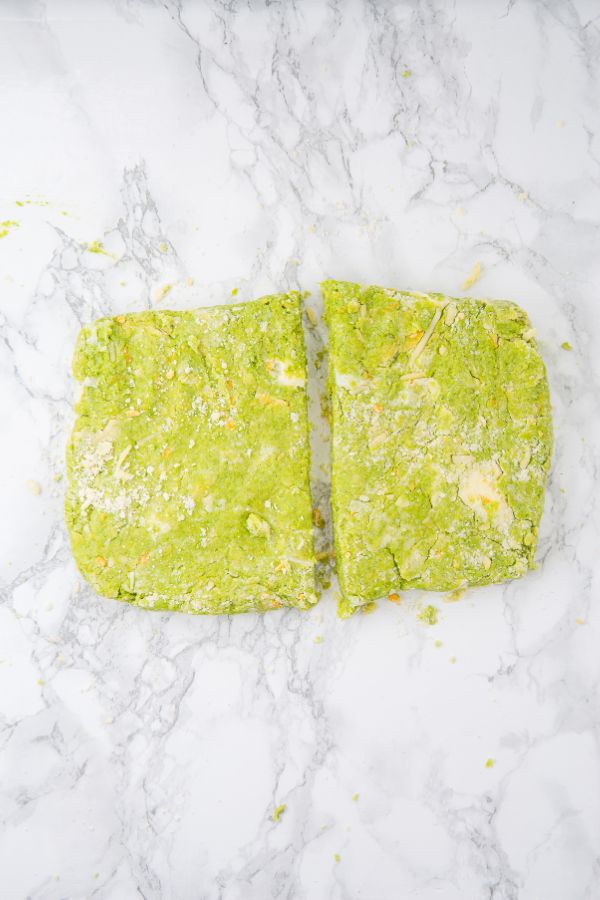 scone dough cut into two pieces.