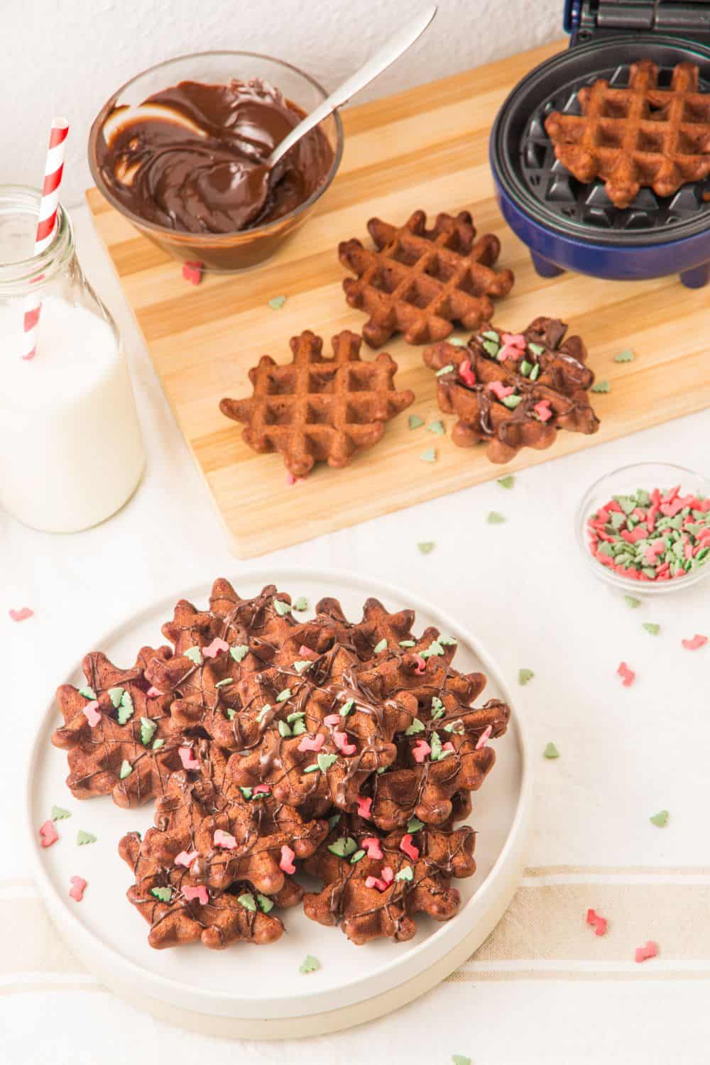 top view of waffle iron cookies on plate with waffle maker.