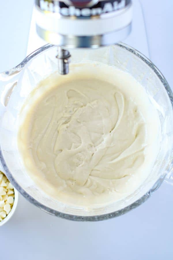 white cupcake mixture in bowl.
